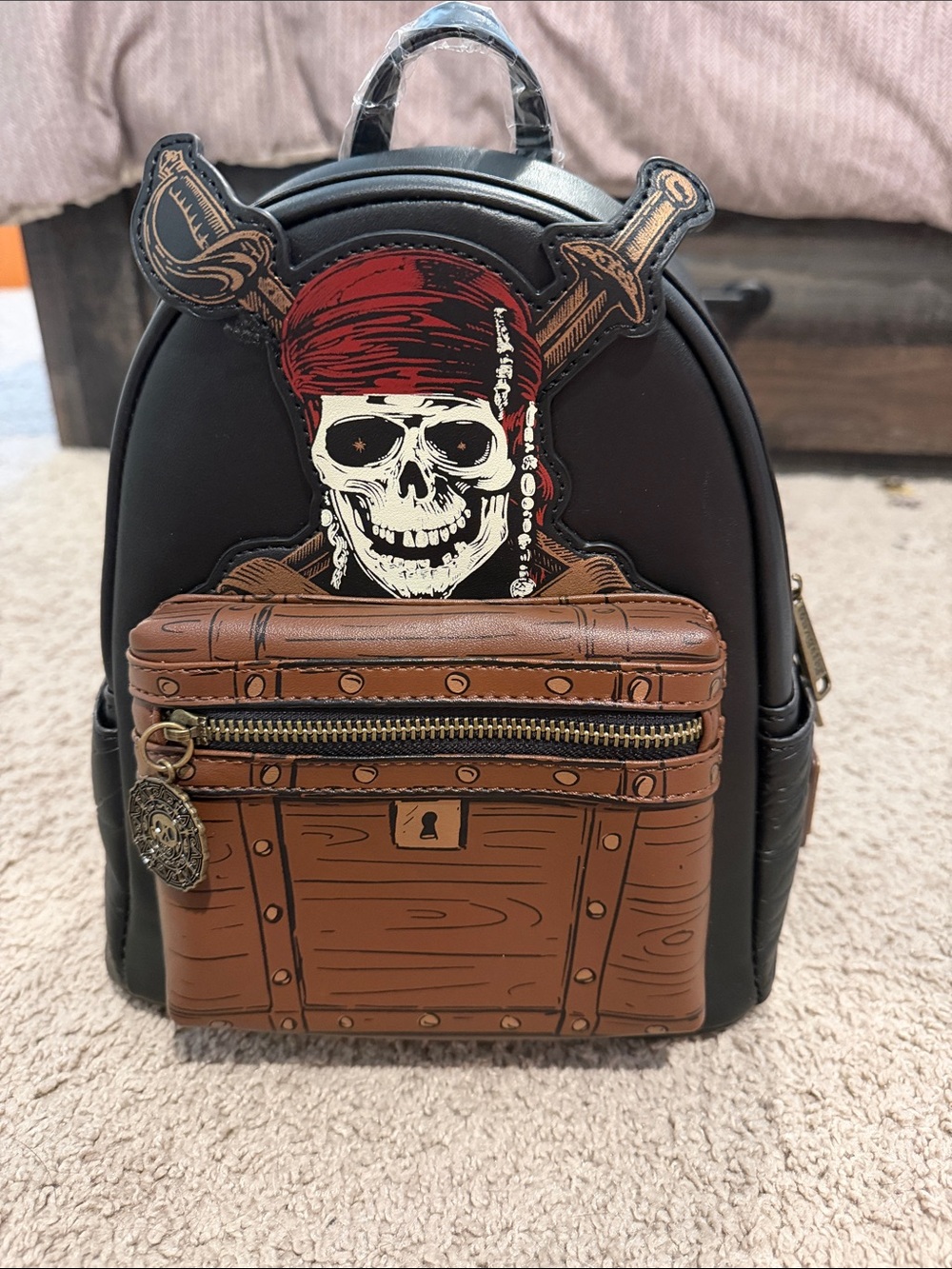 Loungefly Black Pirate Skull Mini Backpack with Brown Treasure Chest Pocket